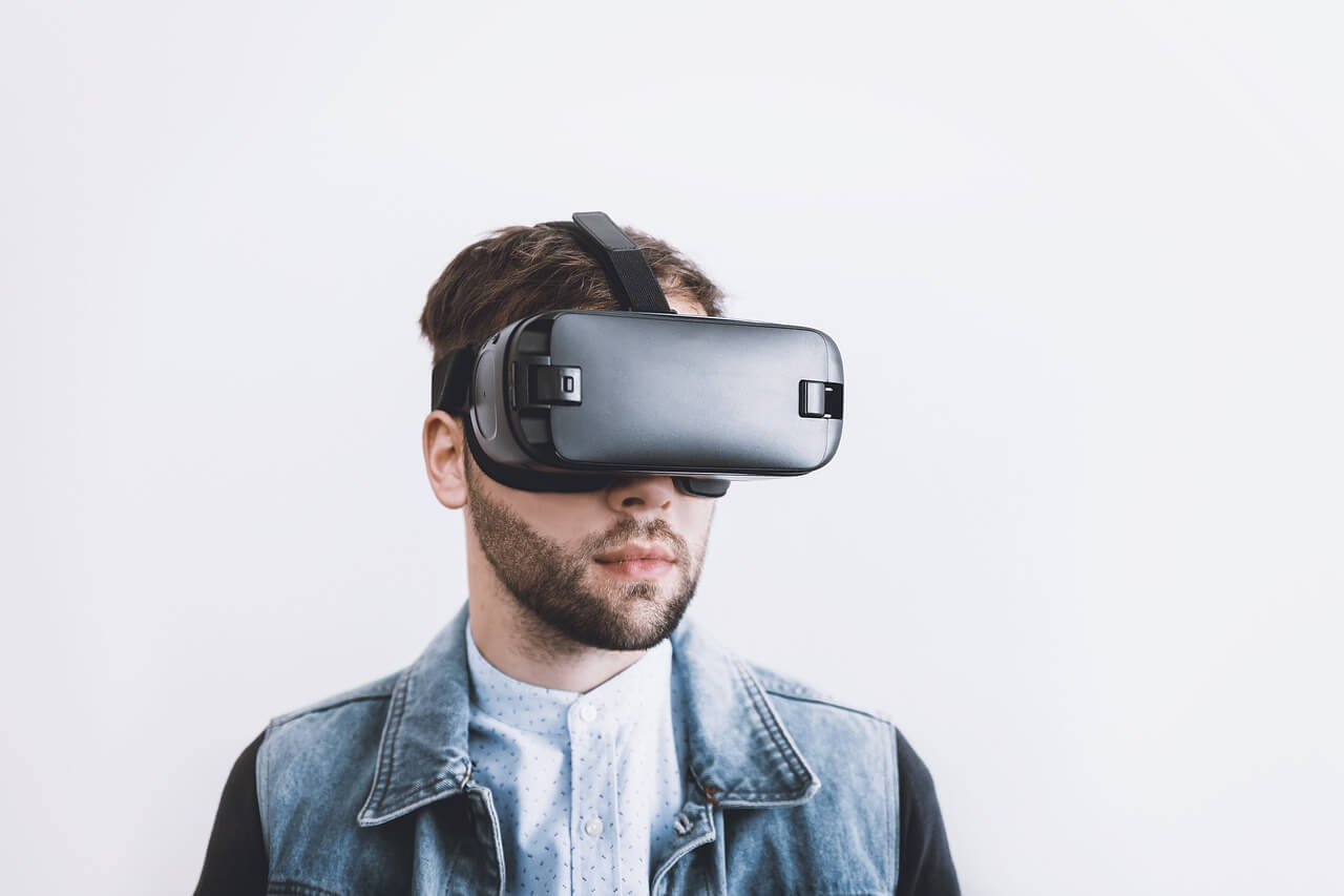 Guy wearing virtual reality headset